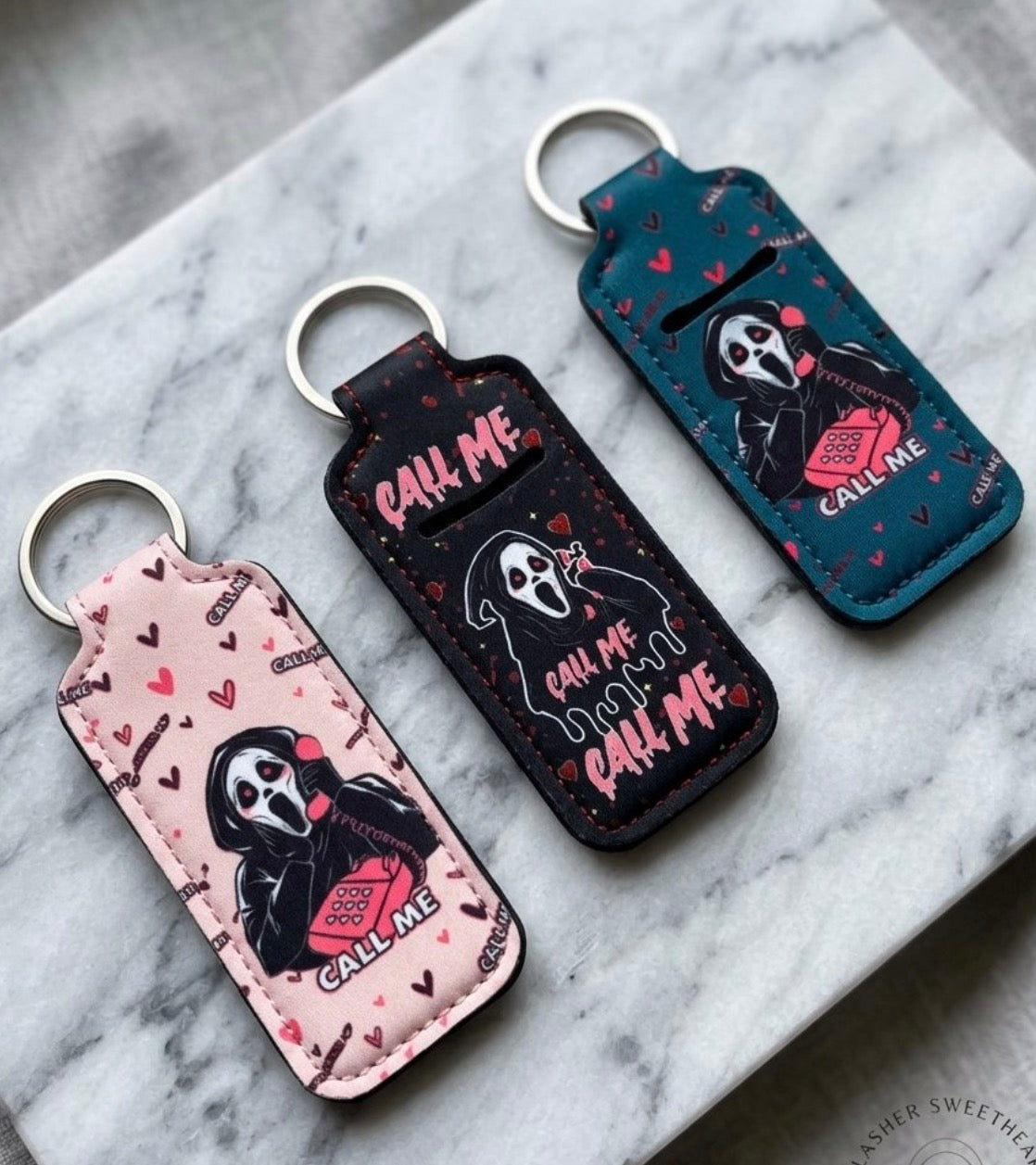 Scream key chain / sanitizer holder